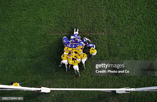 rugby scrum near posts, elevated view - rugbyhemd stock-fotos und bilder