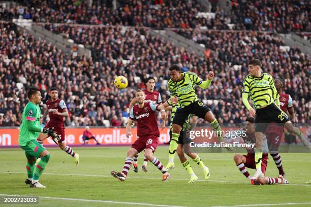 Gabriel of Arsenal scores his team's third goal during the Premier League match between West Ham United and Arsenal FC at London Stadium on February...