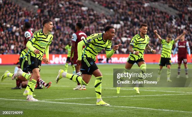 Gabriel of Arsenal celebrates scoring his team's third goal during the Premier League match between West Ham United and Arsenal FC at London Stadium...