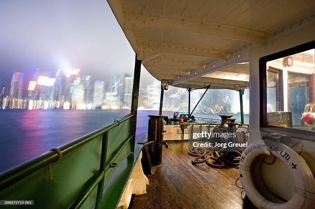 China, Hong Kong harbour, view from ferry, night (blurred motion)