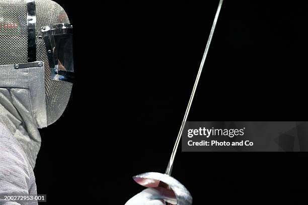 fencer, close-up, side view - mask confrontation stock pictures, royalty-free photos & images