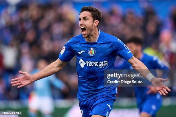 Jaime Mata of Getafe CF celebrates after scoring his team's third goal during the LaLiga EA Sports match between Getafe CF and Celta Vigo at Coliseum...