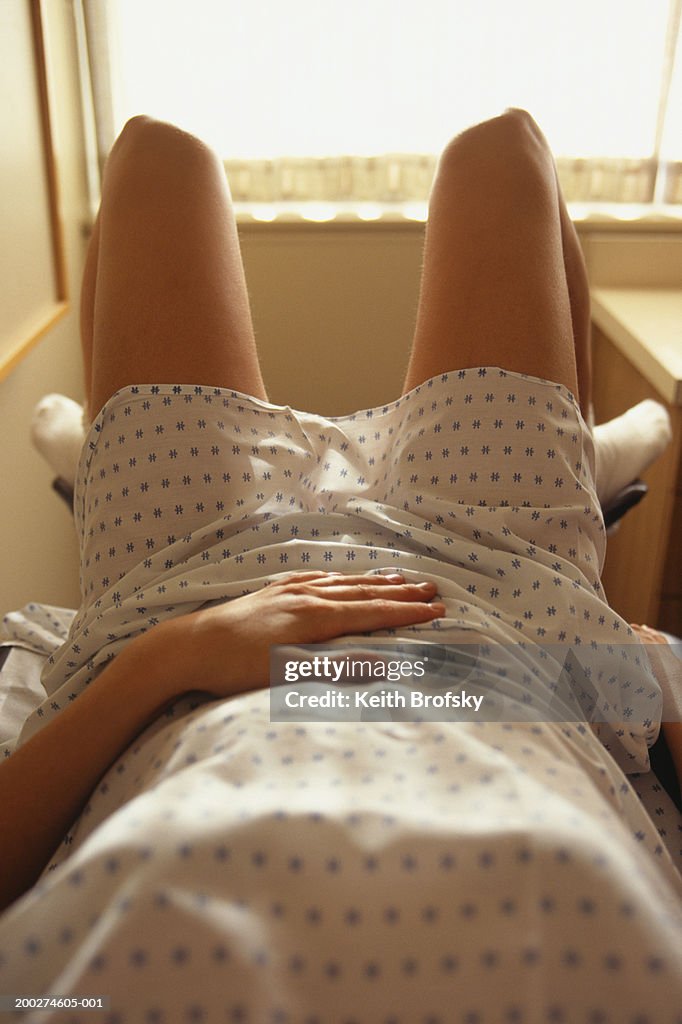 Patient waiting for gynaecological examination, low section, elevated view