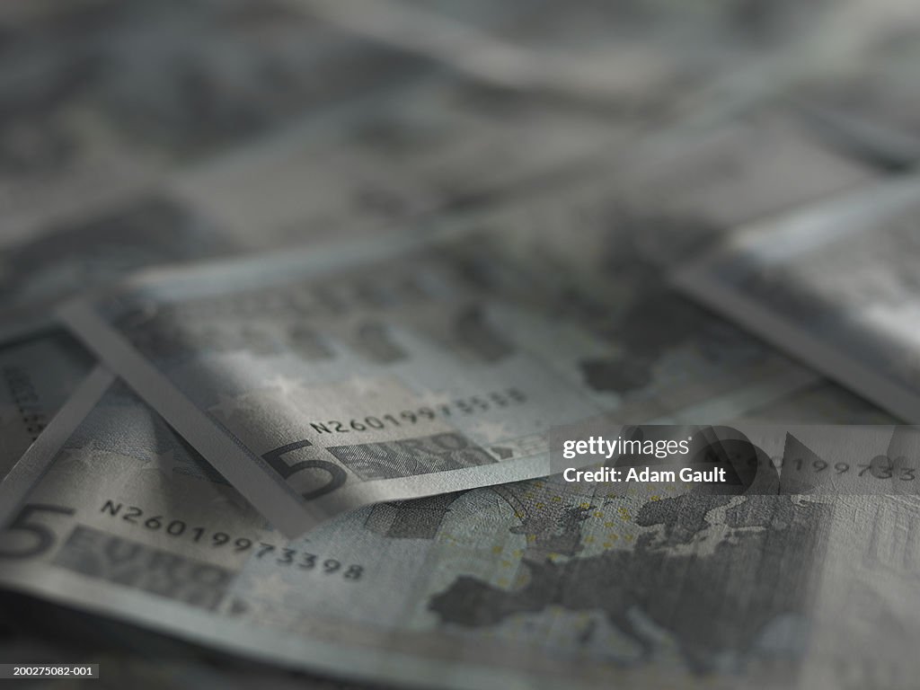 Euro Currency: Loosely piled 5 euro banknotes, close-up