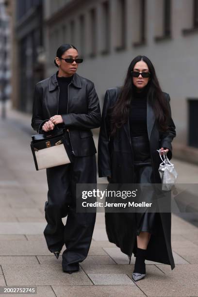 Cherifa Akili wears YSL black sunglasses, gold earrings, Falke black wool knit turtleneck sweater, 12 Storezz black leather jacket, Zara black...