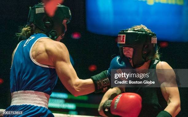 Lowell, MA Kathryn Rindo lands a punch to the face of Katie Donahue. Donahue won a unanimous three round decision.