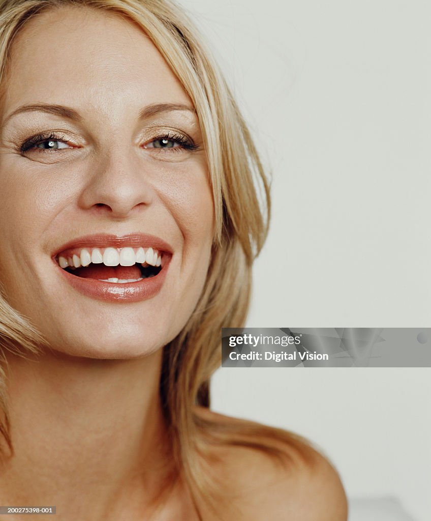 Woman smiling, portrait, close-up