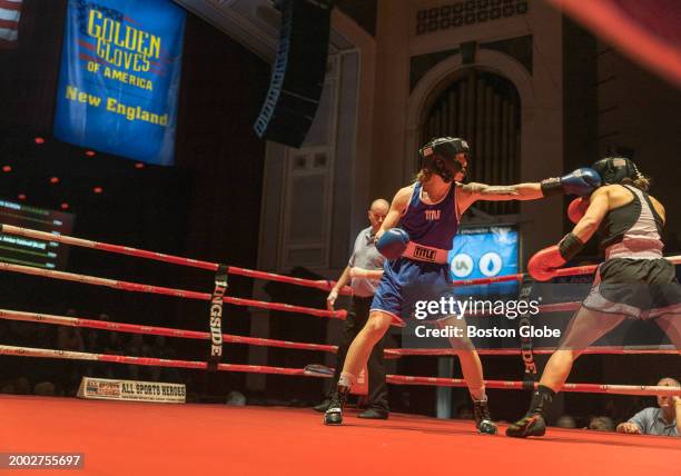 Lowell, MA Kathryn Rindo lands a punch to the face of Katie Donahue. Donahue won a unanimous three round decision.