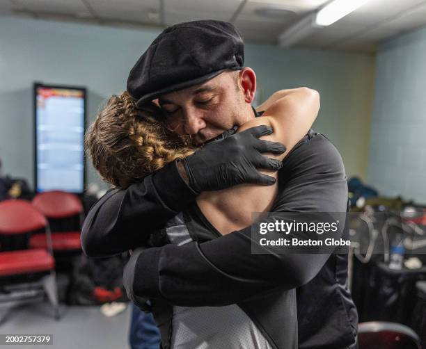 Lowell, MA Katie Donahue hugs her trainer Danny Olivar after defeating Kathryn Rindo.