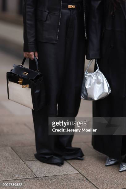 Cherifa Akili wears 12 Storezz black leather jacket, Zara black leather wide leg pants, Hermès Kelly black leather / gold belt, Hermès Kelly black...
