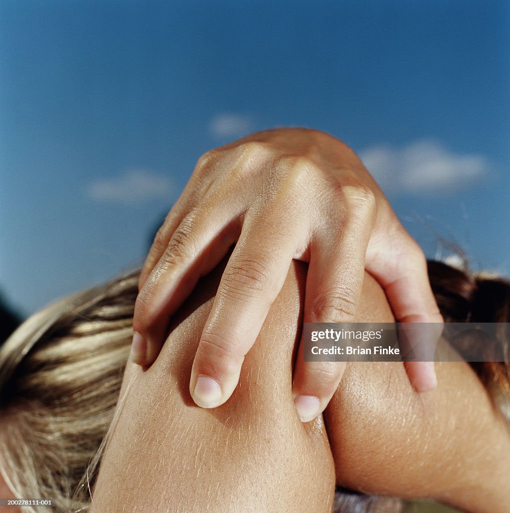 Cheerleader stretching, close-up