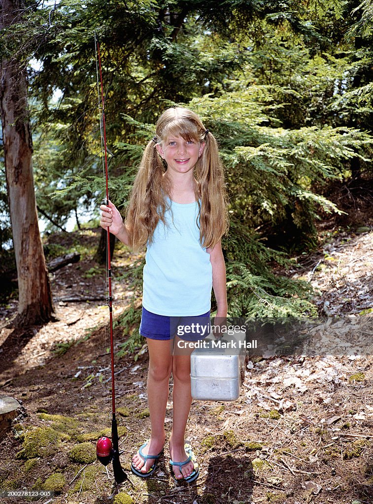 Girl Holding Fishing Rod And Tackle Box Smiling Portrait High-Res