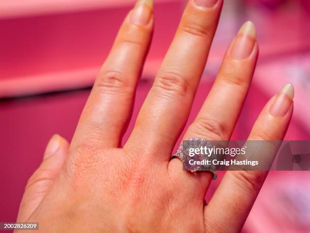 dubai uae - gold and silver souk - traditional engagement pink diamond ring - united arab emirates currency stock pictures, royalty-free photos & images