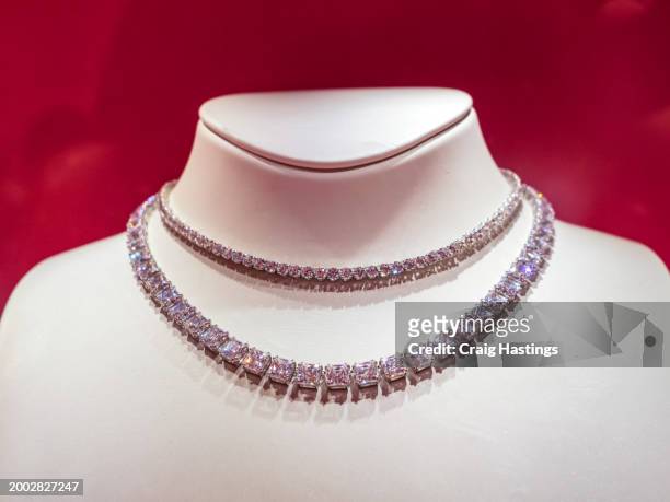 dubai uae - gold and silver souk - traditional engagement pink diamond necklace - united arab emirates currency stock pictures, royalty-free photos & images