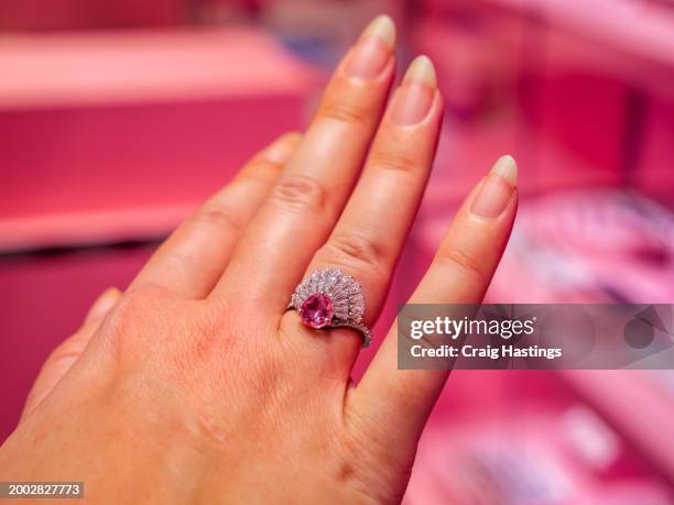 dubai uae - gold and silver souk - traditional engagement pink diamond ring - united arab emirates currency stock pictures, royalty-free photos & images