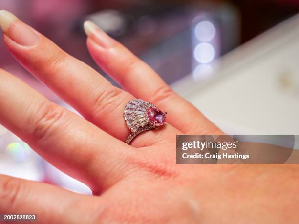 dubai uae - gold and silver souk - traditional engagement pink diamond ring - united arab emirates currency stock pictures, royalty-free photos & images