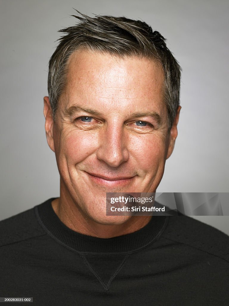 Mature man smiling, portrait