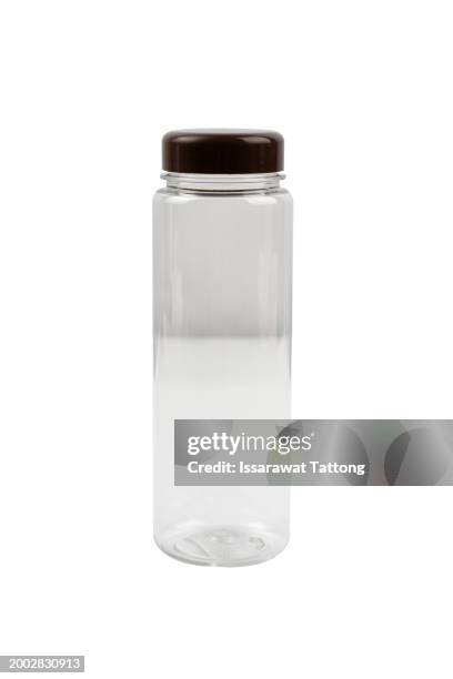 cylindrical clear plastic bottle for drinking water. - full transparency stock pictures, royalty-free photos & images