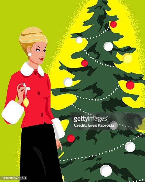 woman decorating christmas tree - weihnachtsbaum schmücken stock-grafiken, -clipart, -cartoons und -symbole