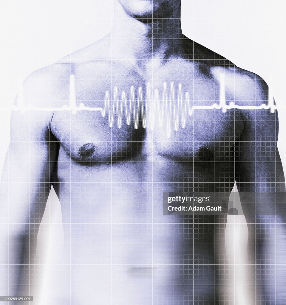 Man with heart rate graph over chest, mid section (Digital Composite)