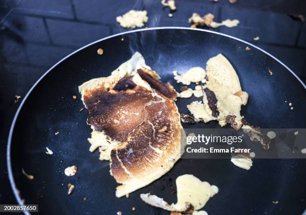 pancake disasters - baking pan stock pictures, royalty-free photos & images