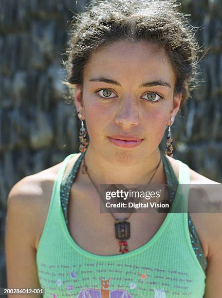 young woman wearing vest top, portrait, close-up - groene ogen stockfoto's en -beelden