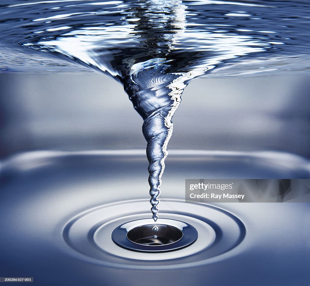 Vortex Of Water Going Down Plughole Underwater View High-Res Stock Photo -  Getty Images