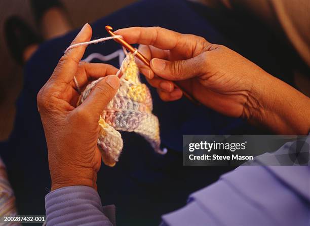 woman crocheting, close-up of hand - かぎ針編み ストックフォトと画像