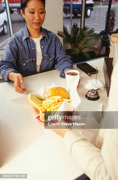 Fast Food Recipient Fast Food Cashier Photos and Premium High Res Pictures - Getty Images