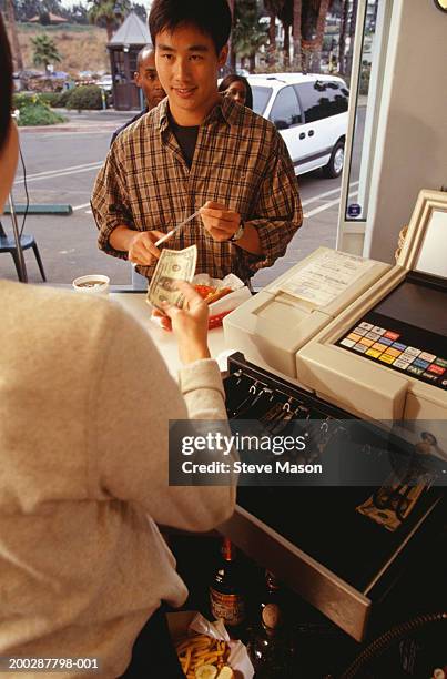 Man Rates Fast Food 315 Fast Food Register Stock Photos, High-Res Pictures, and Images ...