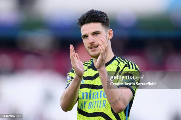 Declan Rice of Arsenal applauds the fans after the team's victory during the Premier League match between West Ham United and Arsenal FC at London...