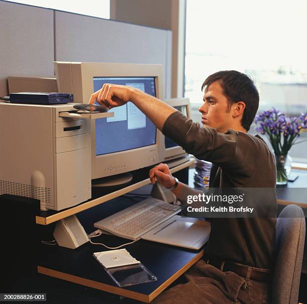 Compact Disc On Computer Compact Desktop Computer Photos and Premium High Res Pictures - Getty ...