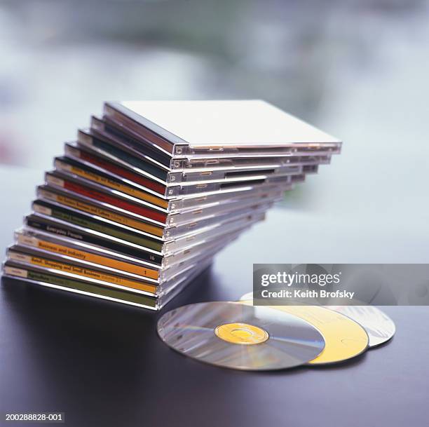 Stack Of Compact Discs Lying On Desk Closeup Elevated View High-Res ...