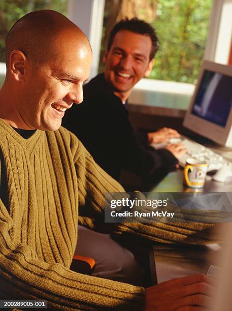 Two Guys Computer Man Laughing Laptop Screen Photos and Premium High Res Pictures - Getty ...