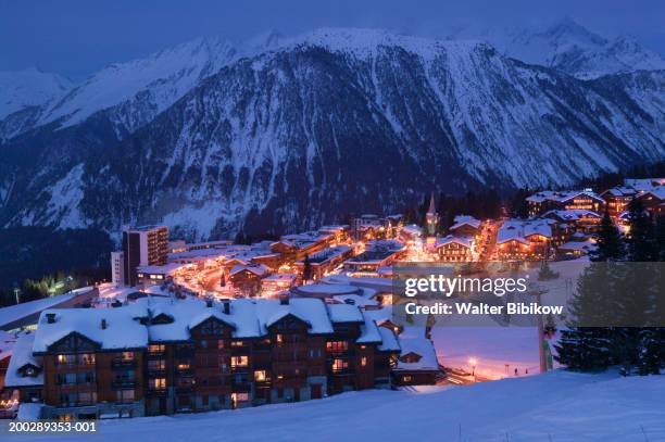 france, haute savoie, courchevel, evening, winter - courchevel stockfoto's en -beelden