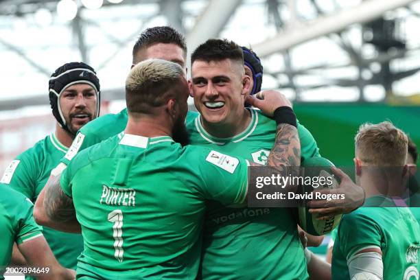 Dan Sheehan of Ireland celebrates with teammates after scoring his second and the team's fourth try during the Guinness Six Nations 2024 match...