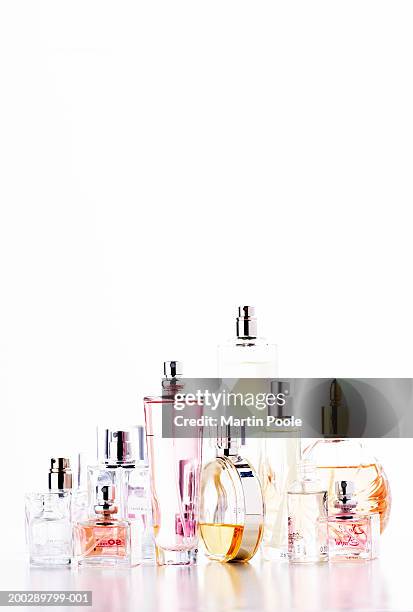 assortment of perfume bottles - perfume atomizer stock pictures, royalty-free photos & images