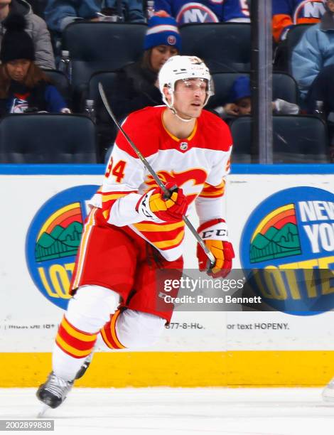 Brayden Pachal of the Calgary Flames skates against the New York Islanders at UBS Arena on February 10, 2024 in Elmont, New York.