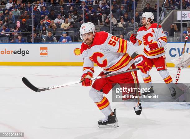 MacKenzie Weegar of the Calgary Flames skates against the New York Islanders at UBS Arena on February 10, 2024 in Elmont, New York.
