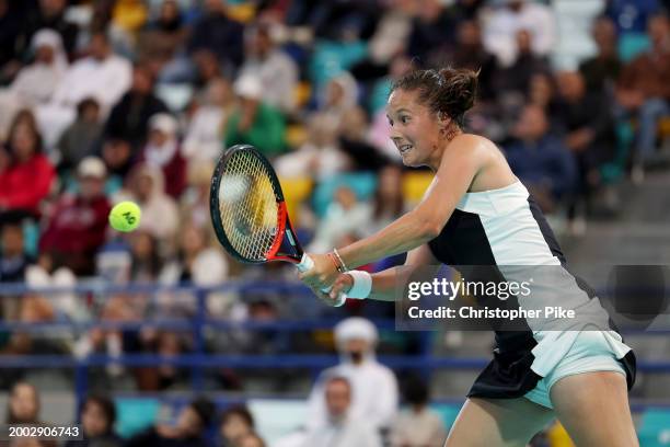 Daria Kasatkina plays a backhand against Elena Rybakina of Kazakhstan during the final match on day 7 of the Mubadala Abu Dhabi Open, part of the...