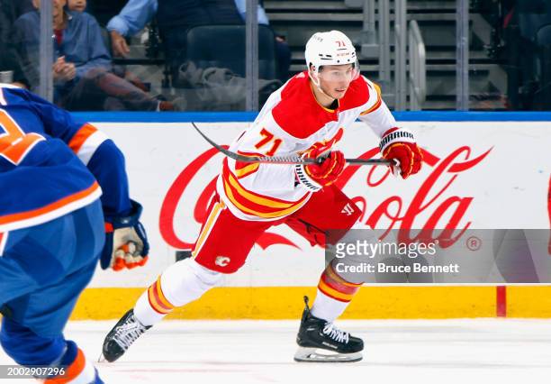 Walker Duehr of the Calgary Flames skates against the New York Islanders at UBS Arena on February 10, 2024 in Elmont, New York.