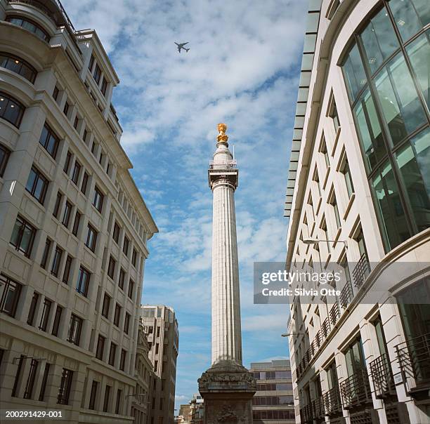 england, london, the monument, low angle view - the monument stock pictures, royalty-free photos & images