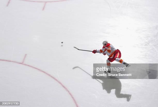 Andrei Kuzmenko of the Calgary Flames warms up prior to a game against the New York Islanders at UBS Arena on February 10, 2024 in Elmont, New York.