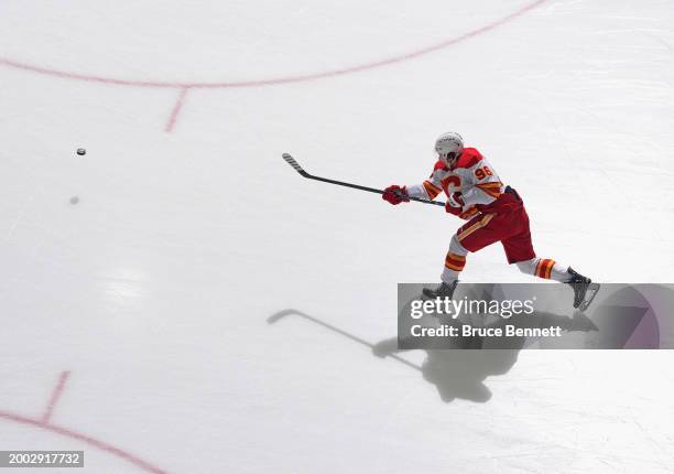 Andrei Kuzmenko of the Calgary Flames warms up prior to a game against the New York Islanders at UBS Arena on February 10, 2024 in Elmont, New York.