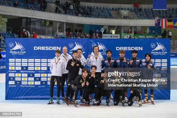 Team Hungary, Team Korea and Team Japan pose on podium after medal ceremony of Men's 5000m Relay during the ISU World Cup Short Track at Joynext...