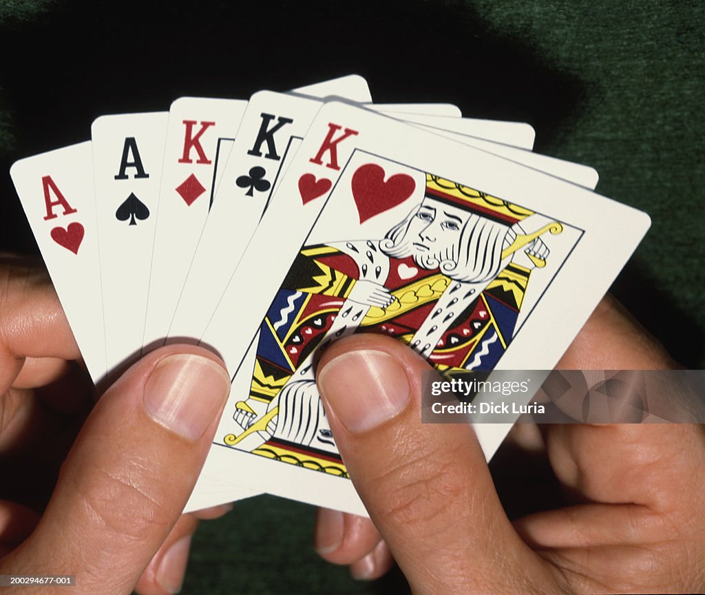 Hands with playing cards