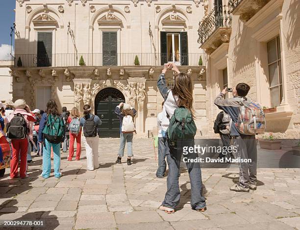 italy, apulia, lecce, children taking pictures of palazzo marrese - field trip stock pictures, royalty-free photos & images