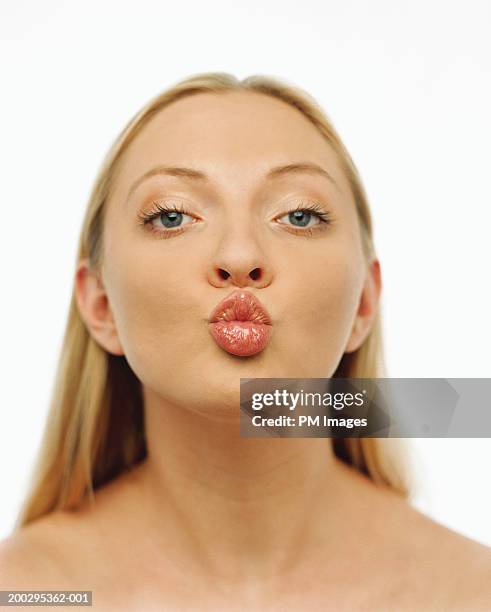 Define Puckered 55 Puckered Face Stock Photos, High-Res Pictures, and Images - Getty Images