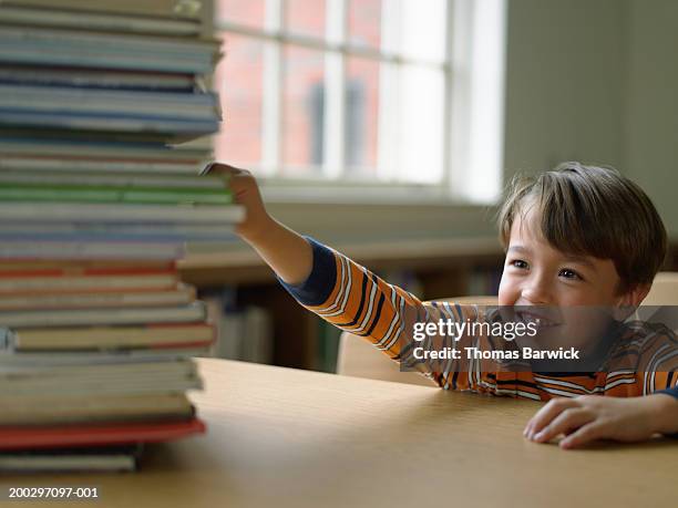 Reaching Books 304 Kid Reaching Book Stock Photos, High-Res Pictures, and Images ...