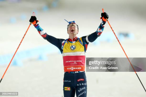 Johannes Thingnes Boe of Norway celebrates as he approaches the finish line to win the Men's 12.5k Pursuit at the IBU World Championships Biathlon...